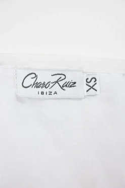 White cotton-blend peek-a-boo puff-sleeve mini bustier dress with Rouleaux trim appliqué