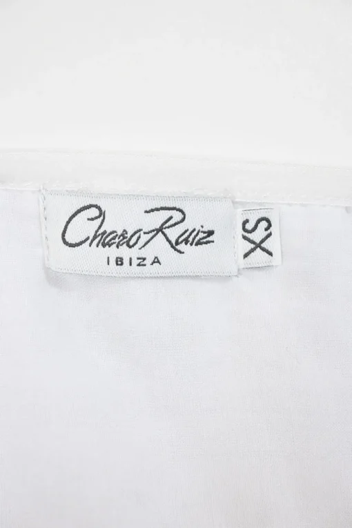 White cotton-blend peek-a-boo puff-sleeve mini bustier dress with Rouleaux trim appliqué