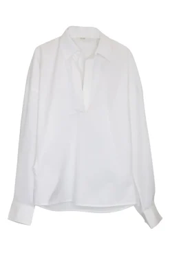 White cotton-blend pullover shirt with classic collar, button cuffs, and round hem