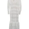 White crochet-trimmed linen plunge neck maxi dress with bishop sleeves and flounce hem