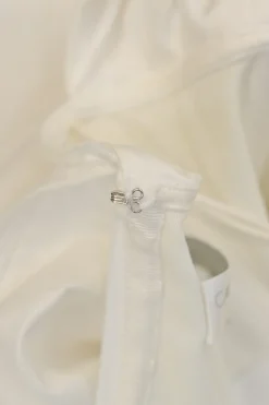 White draped cotton poplin off-shoulder tiered ruffle blouse