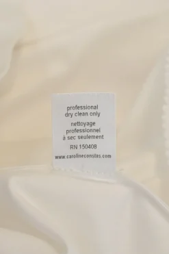 White draped cotton poplin off-shoulder tiered ruffle blouse
