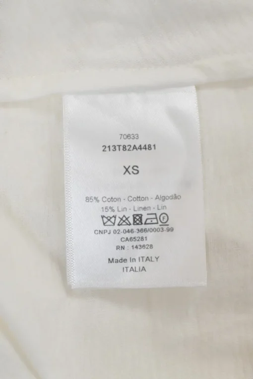 White draped cotton-linen blend asymmetric knot front sleeveless blouse