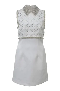 White embellished polyester Delaney sleeveless bridal mini dress featuring bead broderie motif along collar, bodice, and darted waist