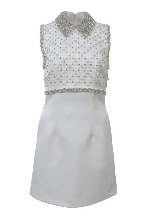 White embellished polyester Delaney sleeveless bridal mini dress featuring bead broderie motif along collar, bodice, and darted waist