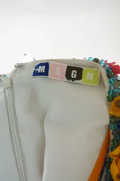 White embellished polyester racerback crop top featuring floral broderie motif