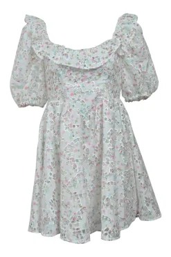 White floral eyelet polyester ruffled baby doll dress with puff sleeves with stacked button-loop back