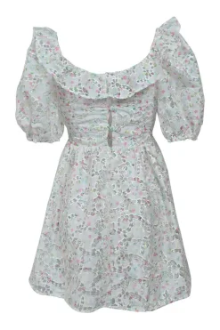White floral eyelet polyester ruffled baby doll dress with puff sleeves with stacked button-loop back