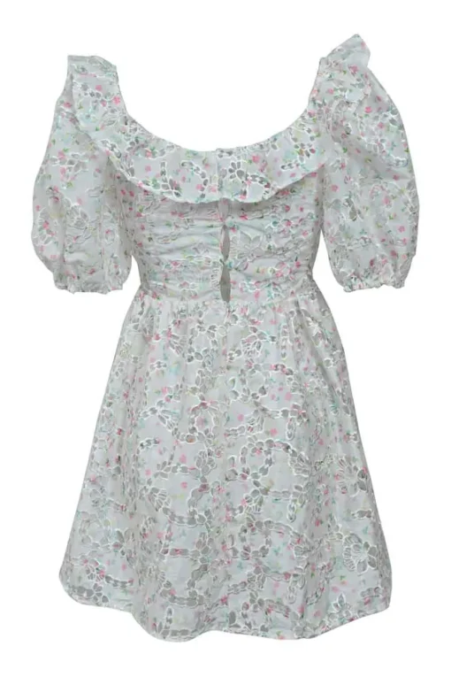 White floral eyelet polyester ruffled baby doll dress with puff sleeves with stacked button-loop back