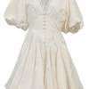 White floral-embroidered cotton-blend balloon sleeve plunge neck mini dress with button-loop empire waist and godet skirt inserts