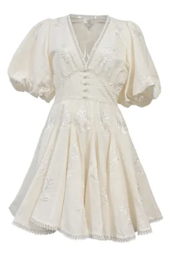 White floral-embroidered cotton-blend balloon sleeve plunge neck mini dress with button-loop empire waist and godet skirt inserts