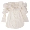 White frill-trimmed polyester cold-shoulder swing-style shirt with exposed button placket and high-low hem