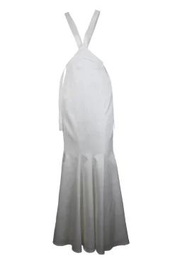 White halter-neck maxi-dress with tie-neck closure and oversized snap embellishments