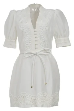 White linen-blend plunge neck puff sleeve tie-waist mini dress with tonal Rouleaux trim details