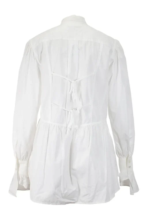 White long-sleeved top with pleated hem