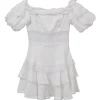 White off-shoulder tier-ruffle puff sleeve micro-mini mini dress featuring tonal crochet lace inserts