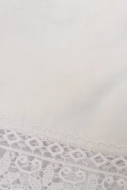 White off-shoulder tier-ruffle puff sleeve micro-mini mini dress featuring tonal crochet lace inserts