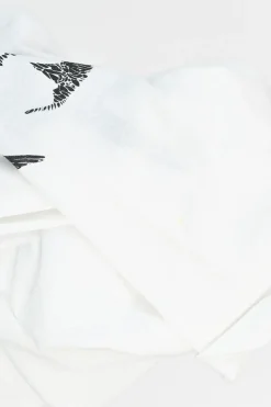 White paneled screen-printed cotton jersey swallow and skull graphic T-shirt with sheer flounce sleeves