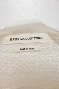 White paneled viscose flutter sleeve bateau neck blouse with scalloped edges