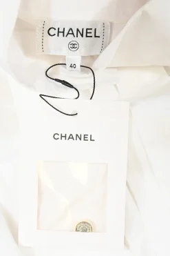 White pleated cotton poplin high band collar sleeveless shirt