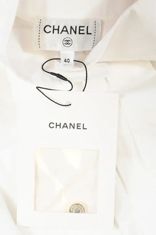 White pleated cotton poplin high band collar sleeveless shirt