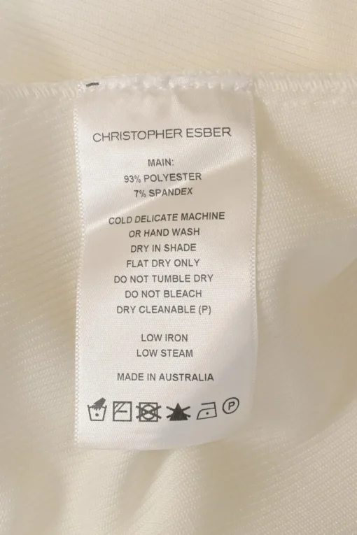 White polyester-blend sleeveless A-line maxi dress with side cutouts