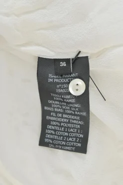 White ramie broderie Anglaise short sleeve A-line mini dress high-low hem