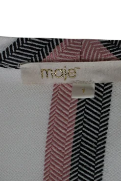 White, red and navy long-sleeve button-up top with embroidery detail