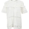 White semi-sheer panelled cotton broderie Anglaise crewneck short sleeve top with fringe trim