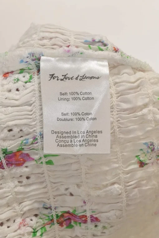 White shirred rose cotton broderie Anglaise puff-sleeve ruffle crop-top