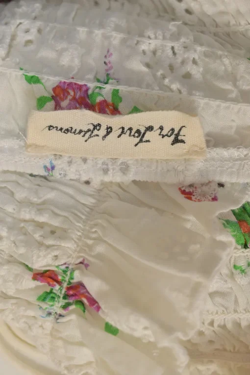 White shirred rose cotton broderie Anglaise puff-sleeve ruffle crop-top