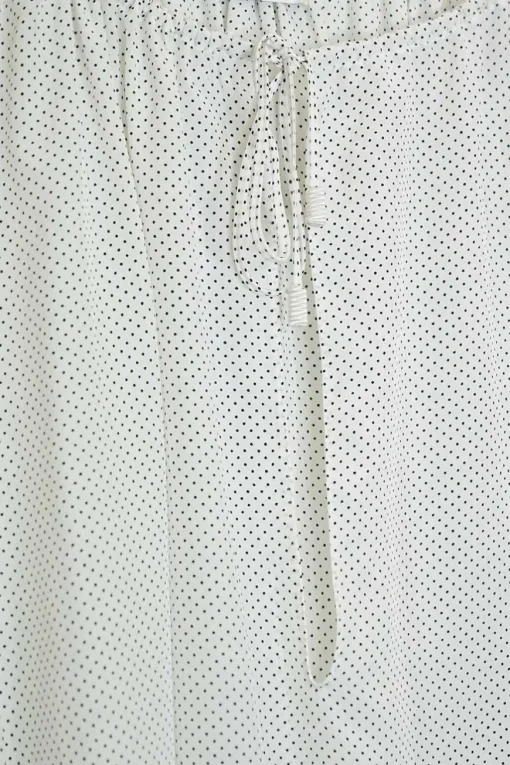 White silk chiffon polka dot print pullover tie-front tunic top with gathered neckline and blouson sleeves