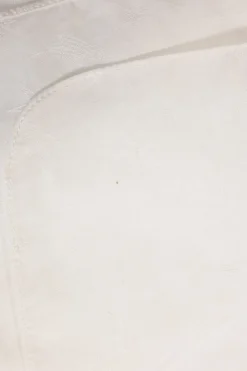 White spread collar shirt with Mother of Peal button fastening