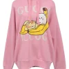 x Crunchyroll pink screen-printed cotton French terry pullover hoodie featuring 'Bananya' motif