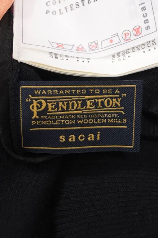x Pendleton Black cotton mixed-media short sleeve pullover knit top with contrasting geo print yoke and plissé back panel