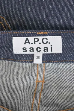 x Sacai mixed-media dark indigo cotton denim and green plissé polyester pull-on A-line knee-length skirt
