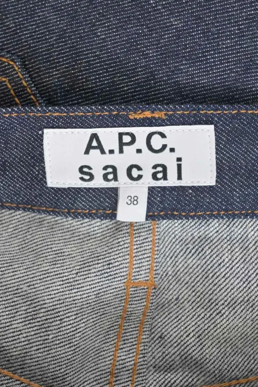 x Sacai mixed-media dark indigo cotton denim and green plissé polyester pull-on A-line knee-length skirt