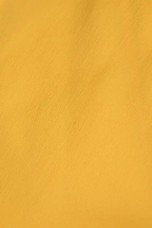 Yellow acetate-blend flutter sleeve pussy-bow blouse