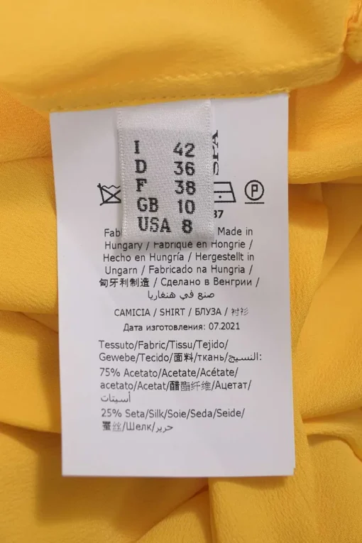 Yellow acetate-blend flutter sleeve pussy-bow blouse