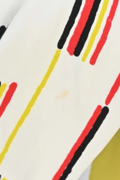 Yellow and chartreuse viscose graphic abstract print mock neck A-line mini dress with contrast piping