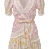 Yellow and pink lace-trimmed cotton floral print puff sleeve wrap mini dress with adjustable ribbon-tie fastening at waist