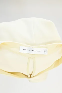 Yellow bias-cut viscose-blend angel sleeve V-neck blouse