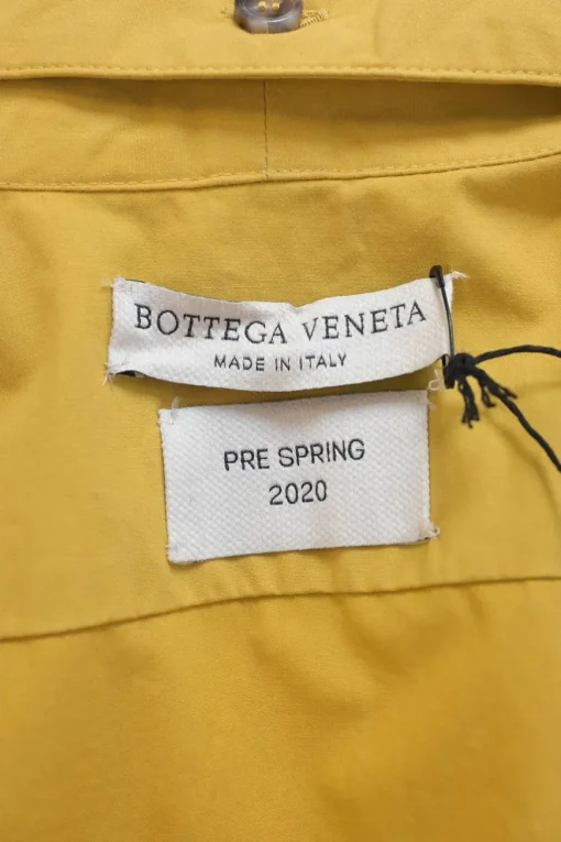 Yellow cotton stand collar dolman sleeve button-front shirt dress with oversized bellows pocket shoulders