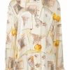 Yellow draped silk foulard print pullover blouse with asymmetric button-loop cowl collar