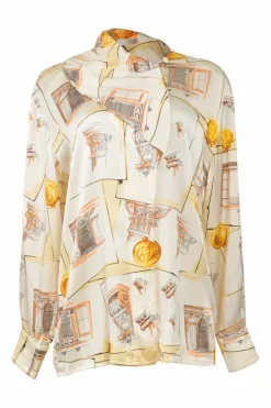 Yellow draped silk foulard print pullover blouse with asymmetric button-loop cowl collar