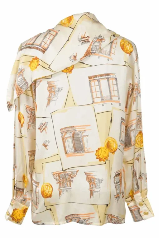 Yellow draped silk foulard print pullover blouse with asymmetric button-loop cowl collar