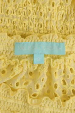 Yellow eyelet polyester strapless blouson cover-up with drawstring bustline