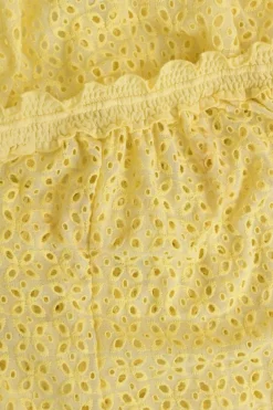 Yellow eyelet polyester strapless blouson cover-up with drawstring bustline