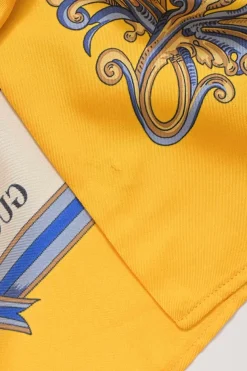 Yellow Intrigue-print silk kimono shirt with flap collar and tassel motif