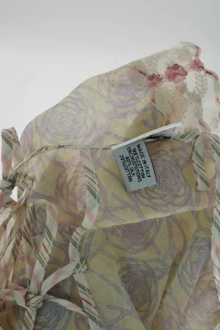 Yellow lace-trimmed semi-sheer cotton voile camellia print tie-back camisole with fixed straps